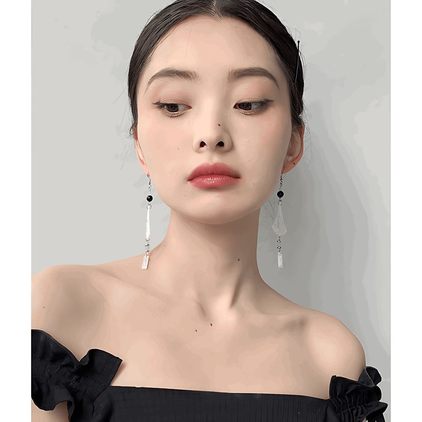 Chimes Earrings, detail view of the handcrafted silver earrings