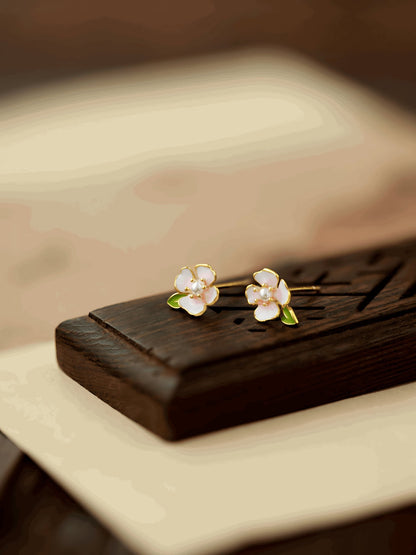Camellia Earrings, detail view of the handcrafted silver earrings