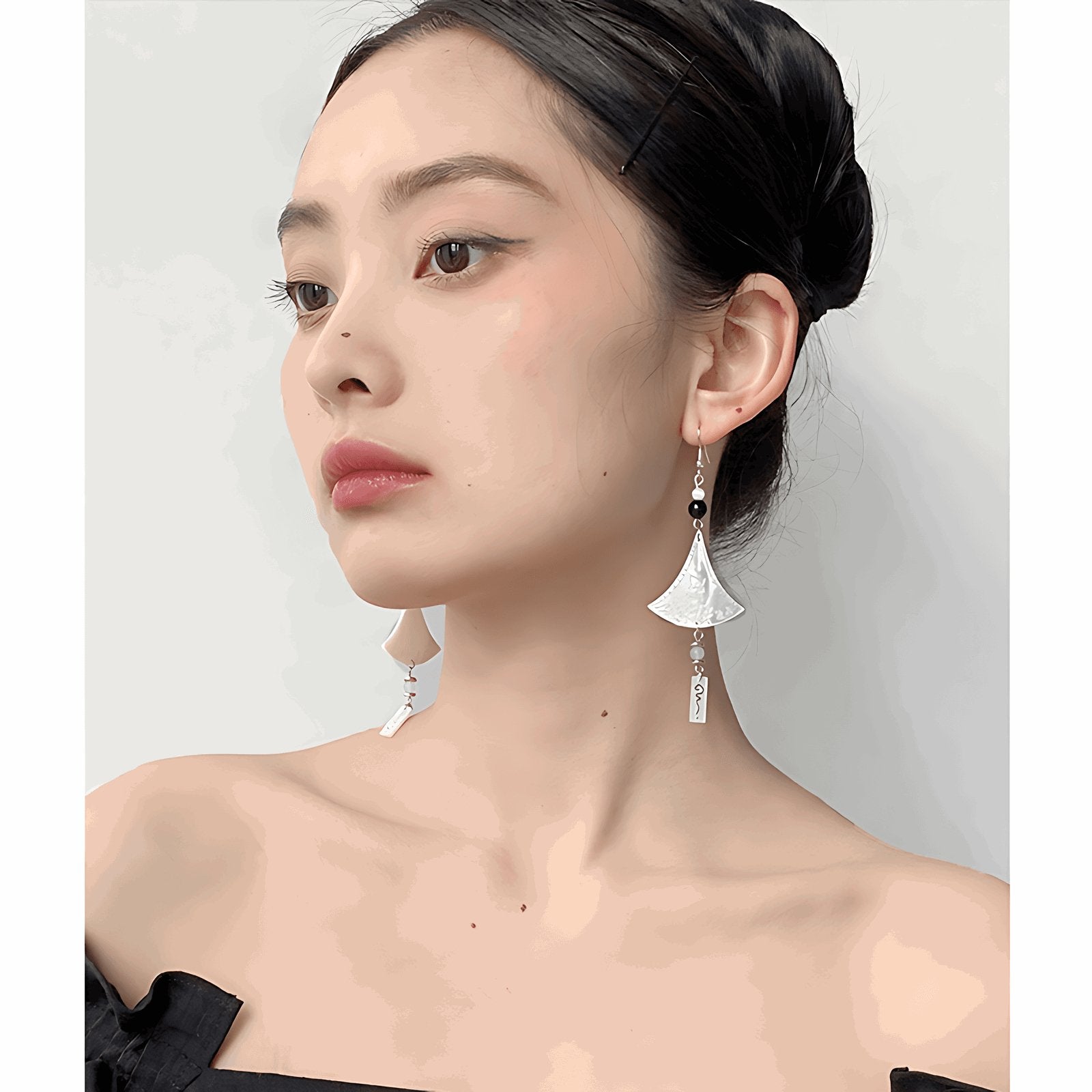 Chimes Earrings, detail view of the handcrafted silver earrings