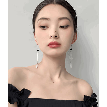 Chimes Earrings, detail view of the handcrafted silver earrings