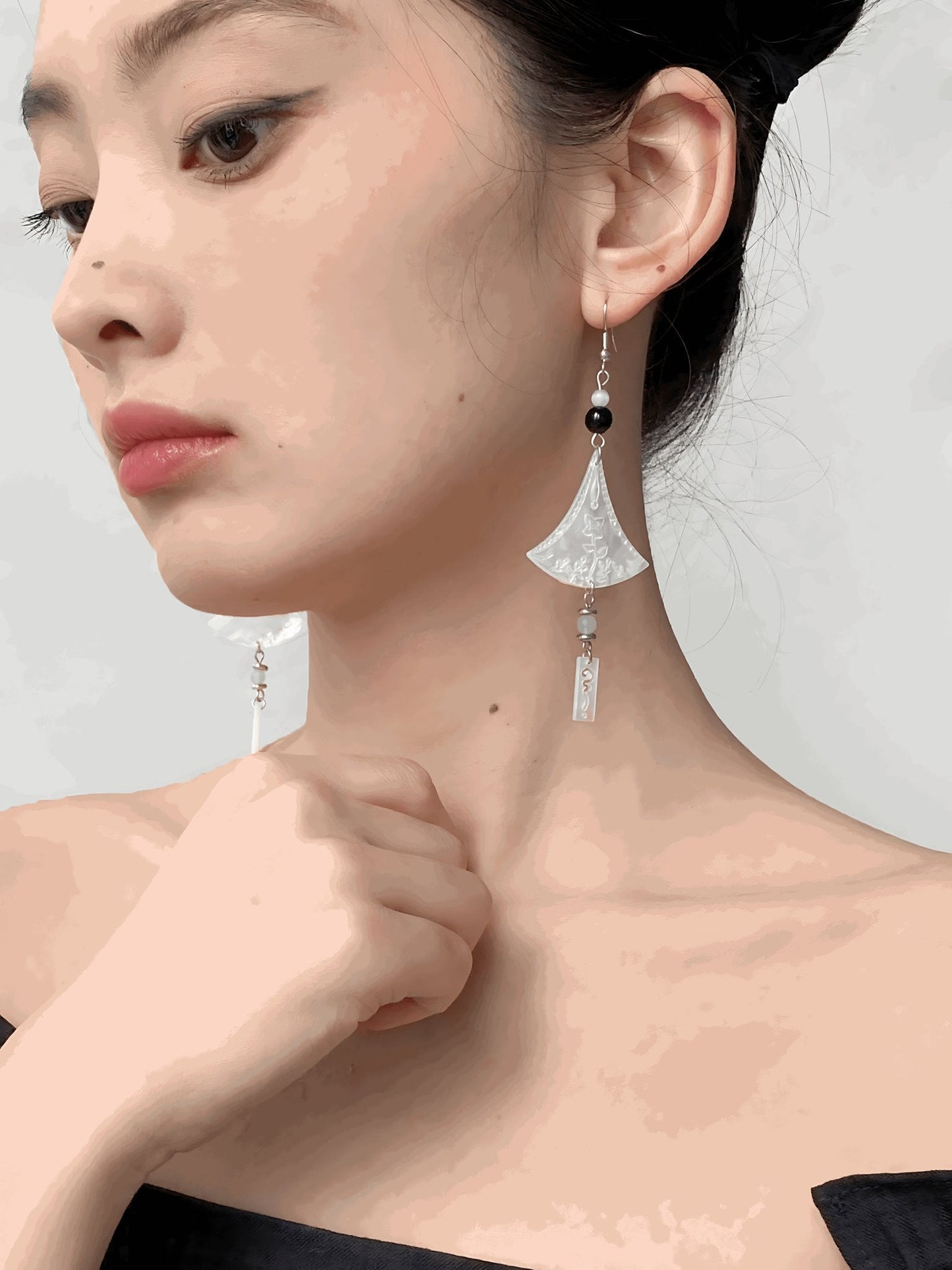 Chimes Earrings, detail view of the handcrafted silver earrings