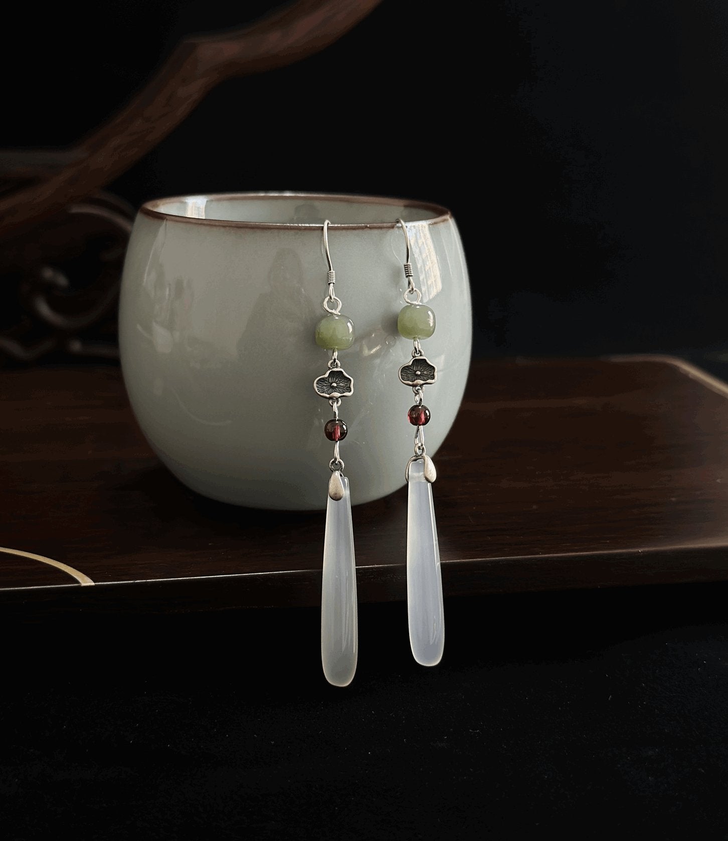 Egret Jade Earrings, detail view of the handcrafted natural stone earrings