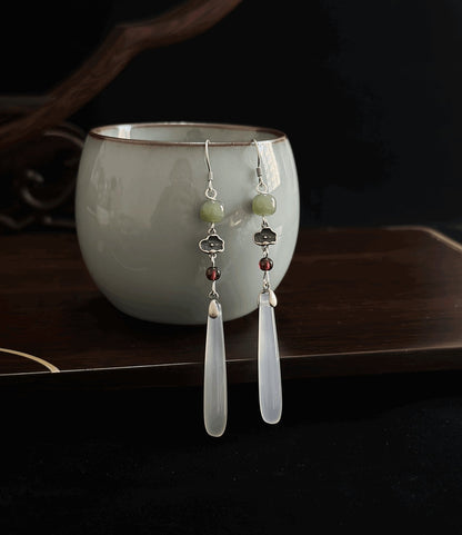 Egret Jade Earrings, detail view of the handcrafted natural stone earrings