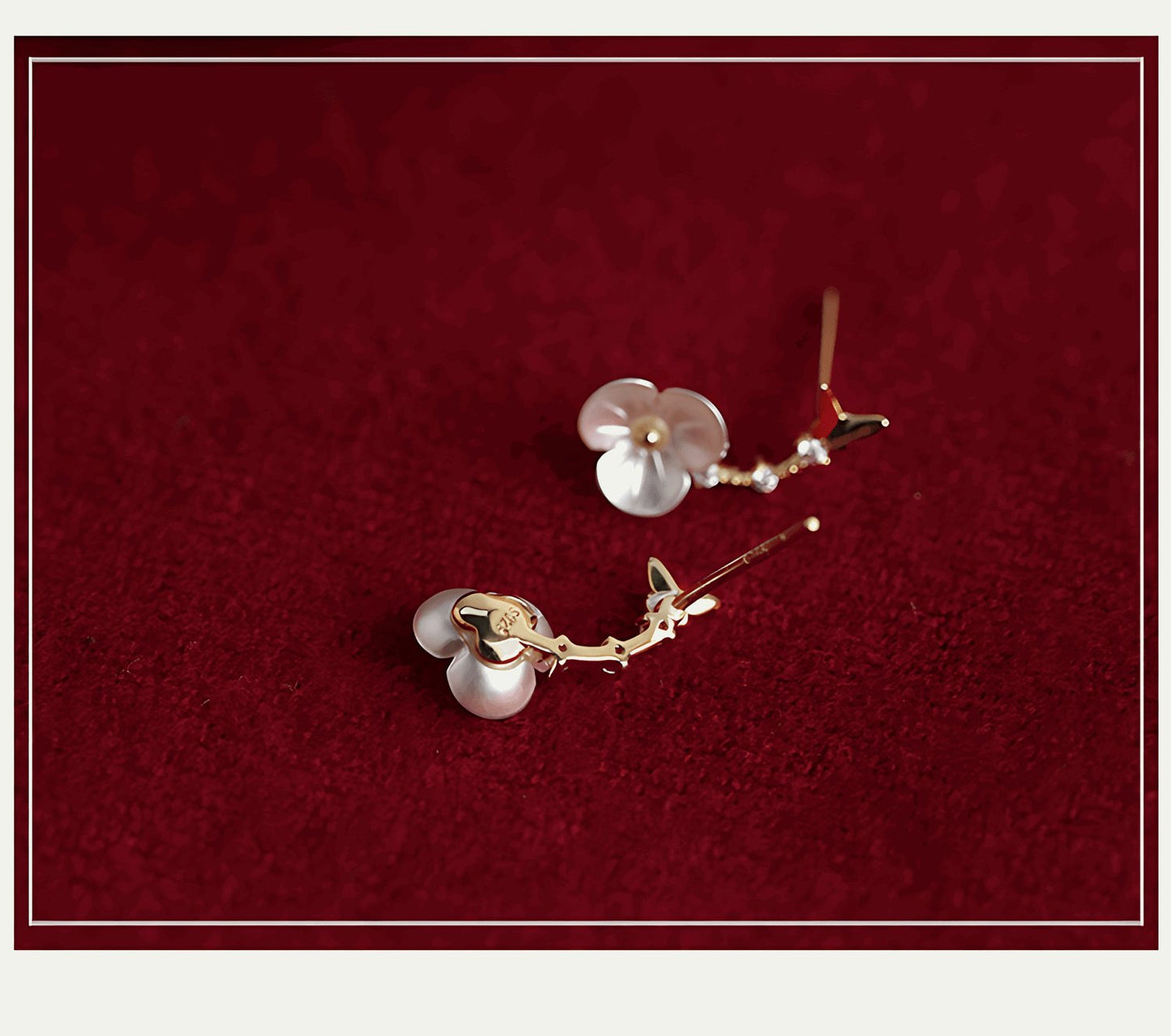 Flower Branch Gold, detail view of the handcrafted silver earrings