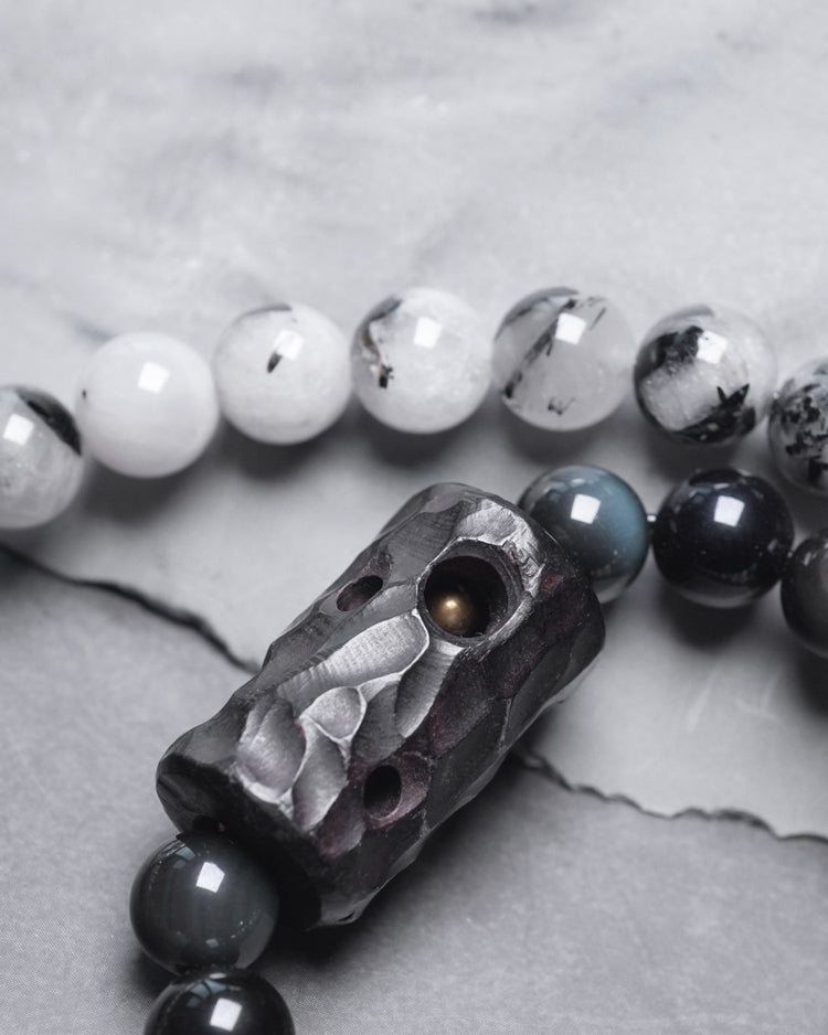 Chinese crystal bracelet with ink wash, detail view of the handcrafted silver bracelet