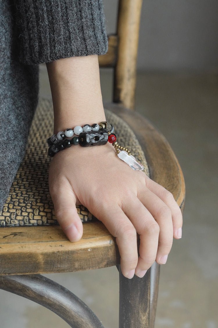 Chinese crystal bracelet with ink wash, detail view of the handcrafted silver bracelet