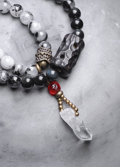 Chinese crystal bracelet with ink wash, detail view of the handcrafted silver bracelet