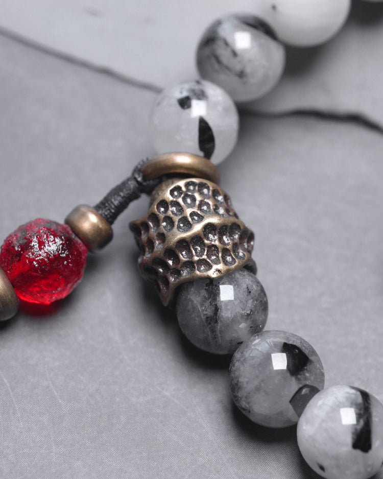 Chinese crystal bracelet with ink wash, detail view of the handcrafted silver bracelet