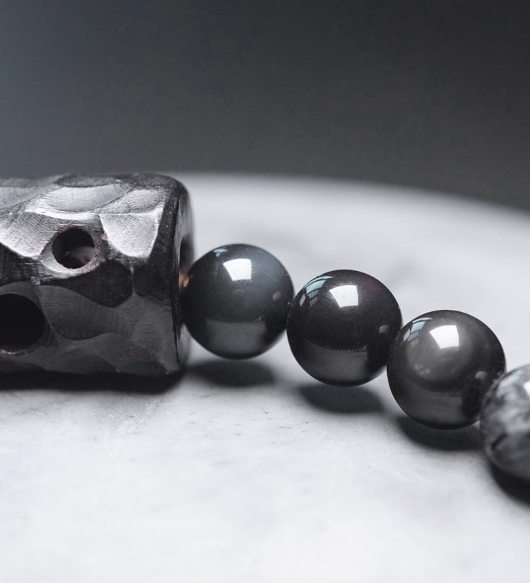 Chinese crystal bracelet with ink wash, detail view of the handcrafted silver bracelet