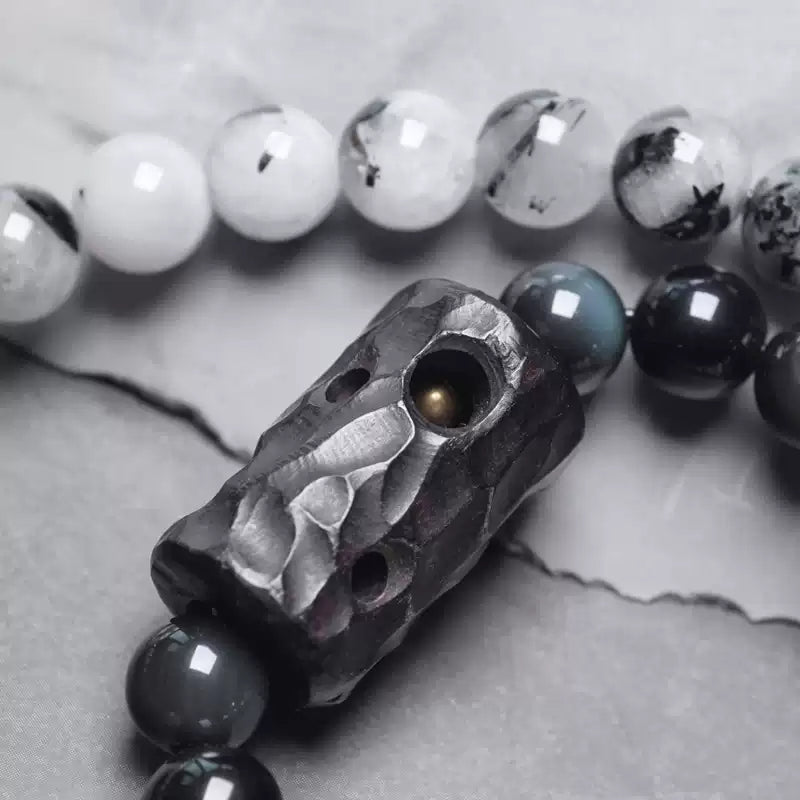 Chinese crystal bracelet with ink wash, detail view of the handcrafted silver bracelet