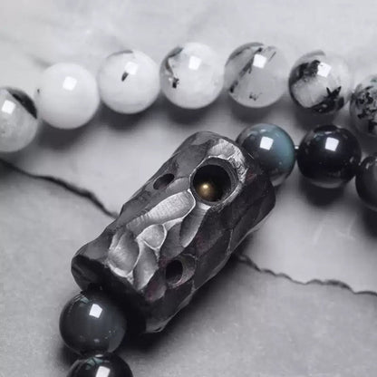 Chinese crystal bracelet with ink wash, detail view of the handcrafted silver bracelet