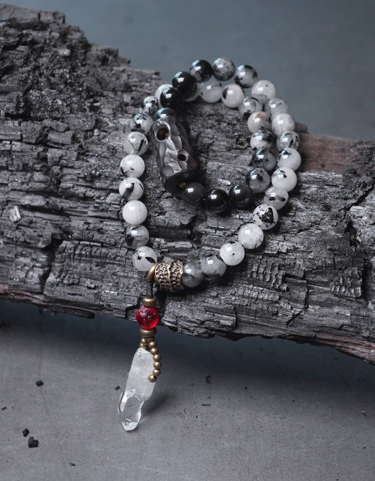 Chinese crystal bracelet with ink wash, detail view of the handcrafted silver bracelet