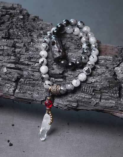 Chinese crystal bracelet with ink wash, detail view of the handcrafted silver bracelet