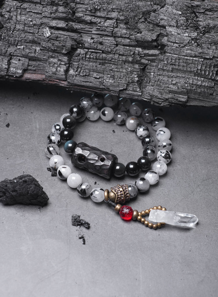 Chinese crystal bracelet with ink wash, detail view of the handcrafted silver bracelet