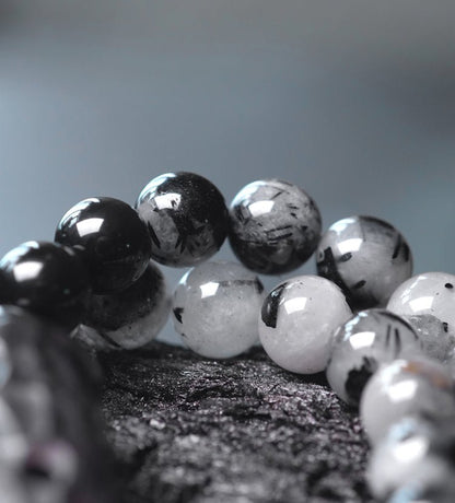 Chinese crystal bracelet with ink wash, detail view of the handcrafted silver bracelet