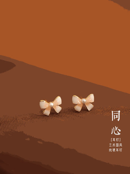 Mini Butterfly Jade Earrings, detail view of the handcrafted natural stone earrings