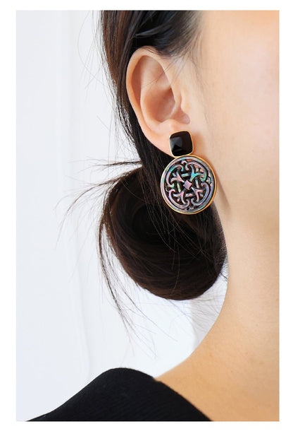 Palace Necklace, detail view of the handcrafted silver earrings