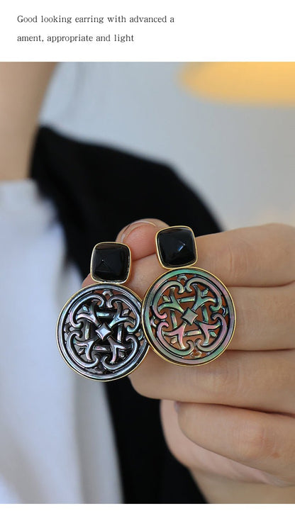 Palace Necklace, detail view of the handcrafted silver earrings