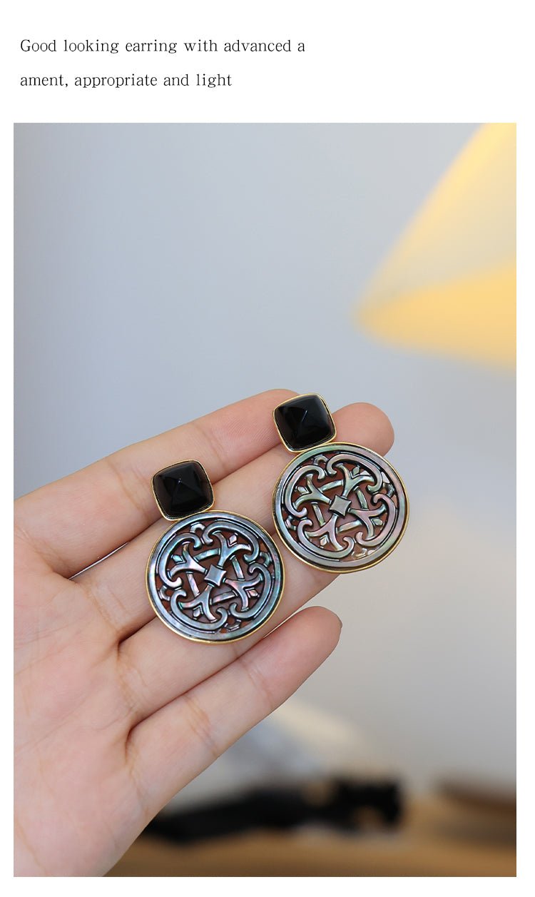 Palace Necklace, detail view of the handcrafted silver earrings