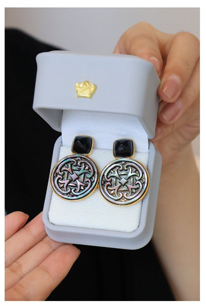 Palace Necklace, detail view of the handcrafted silver earrings