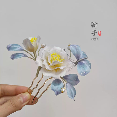 QianXiangYin Velvet Flower Hairpin, detail view of the handcrafted silk velvet flower hairpin