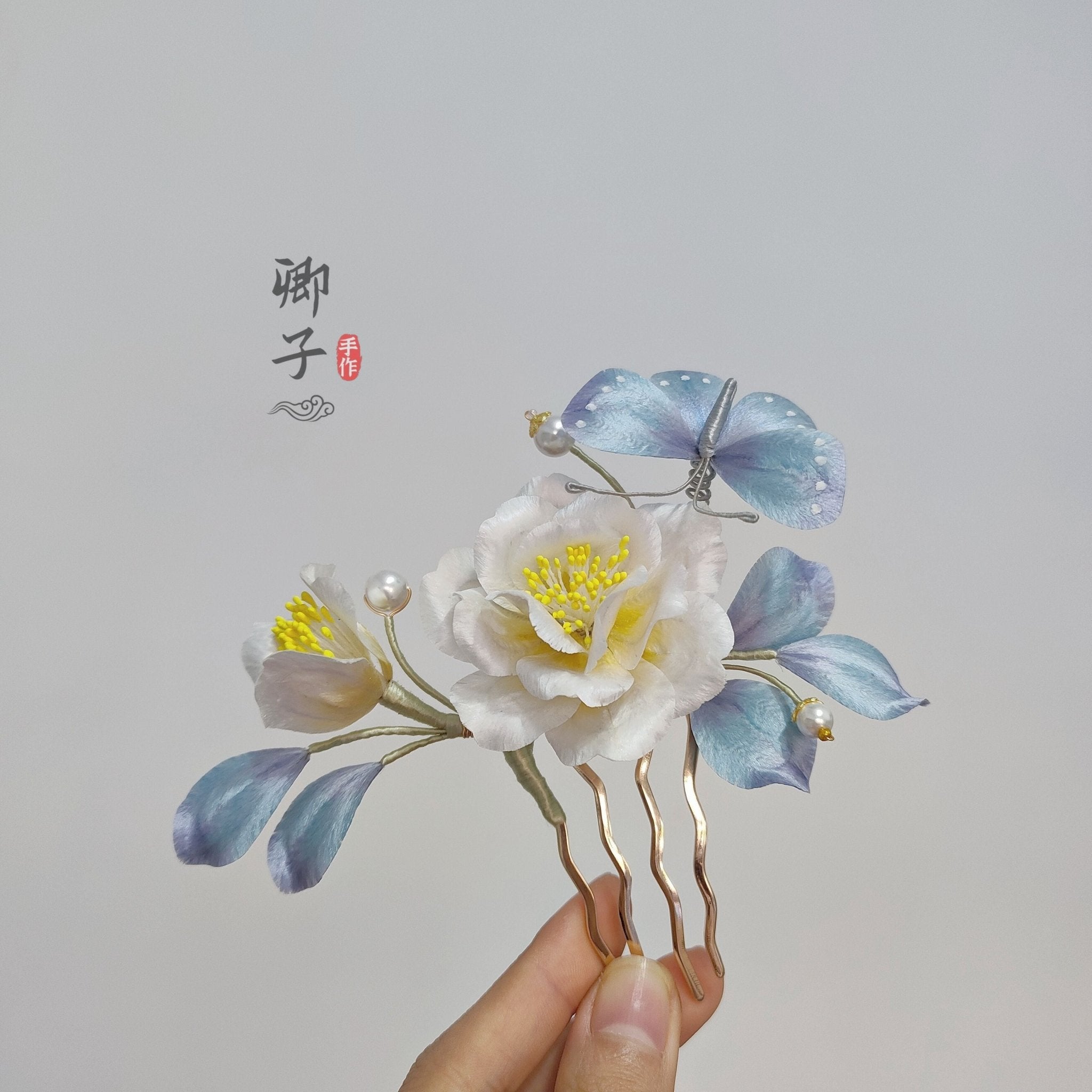 QianXiangYin Velvet Flower Hairpin, detail view of the handcrafted silk velvet flower hairpin