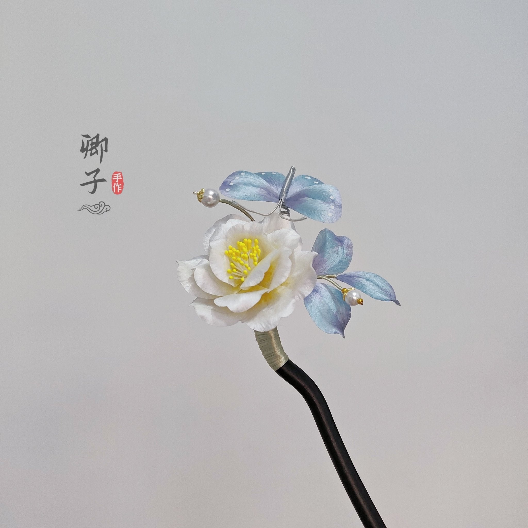 QianXiangYin Velvet Flower Hairpin, detail view of the handcrafted silk velvet flower hairpin