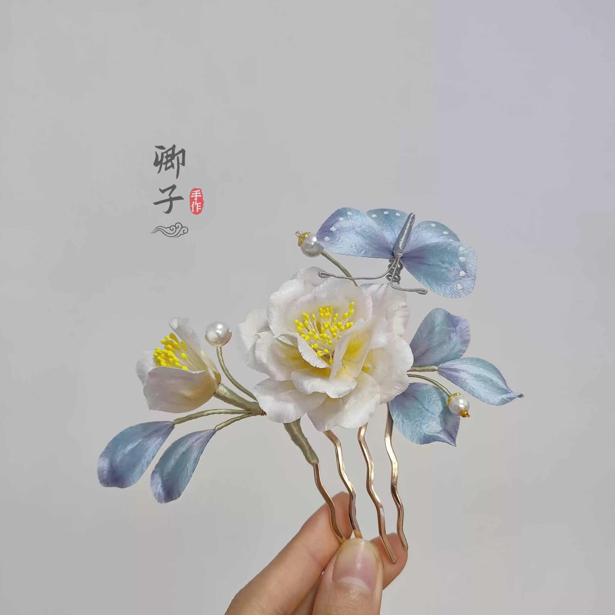 QianXiangYin Velvet Flower Hairpin, detail view of the handcrafted silk velvet flower hairpin