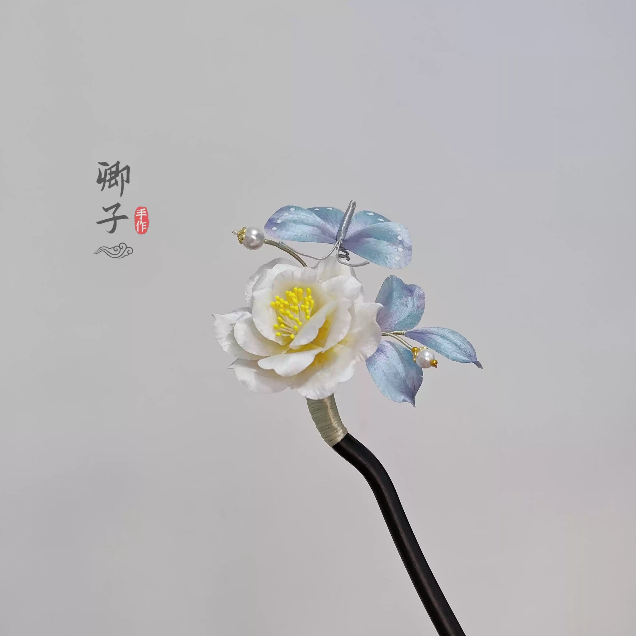 QianXiangYin Velvet Flower Hairpin, detail view of the handcrafted silk velvet flower hairpin