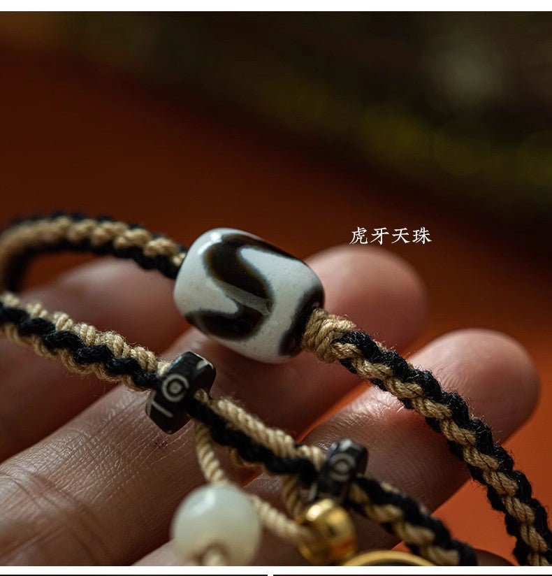 Tibetan - Style Dzi Bead with Handwoven Cord - OrientGem