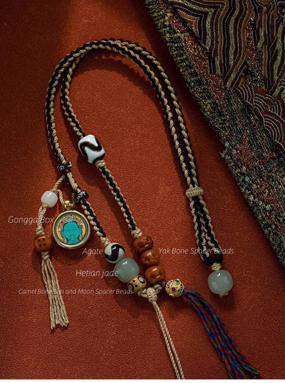 Tibetan - Style Dzi Bead with Handwoven Cord - necklace - ORIENTGEM