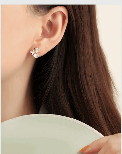 Tiny Flower Earring, detail view of the handcrafted silver earrings