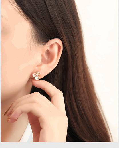 Tiny Flower Earring, alternate view of the handcrafted silver earrings